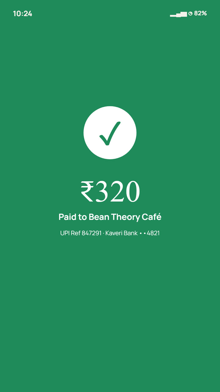 A UPI payment of ₹320 to Bean Theory Café